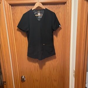 Women’s Careisma by Sofia Vergara scrub top large.     V- neck